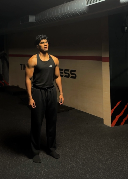Joel Dsouza training in a dimly lit gym